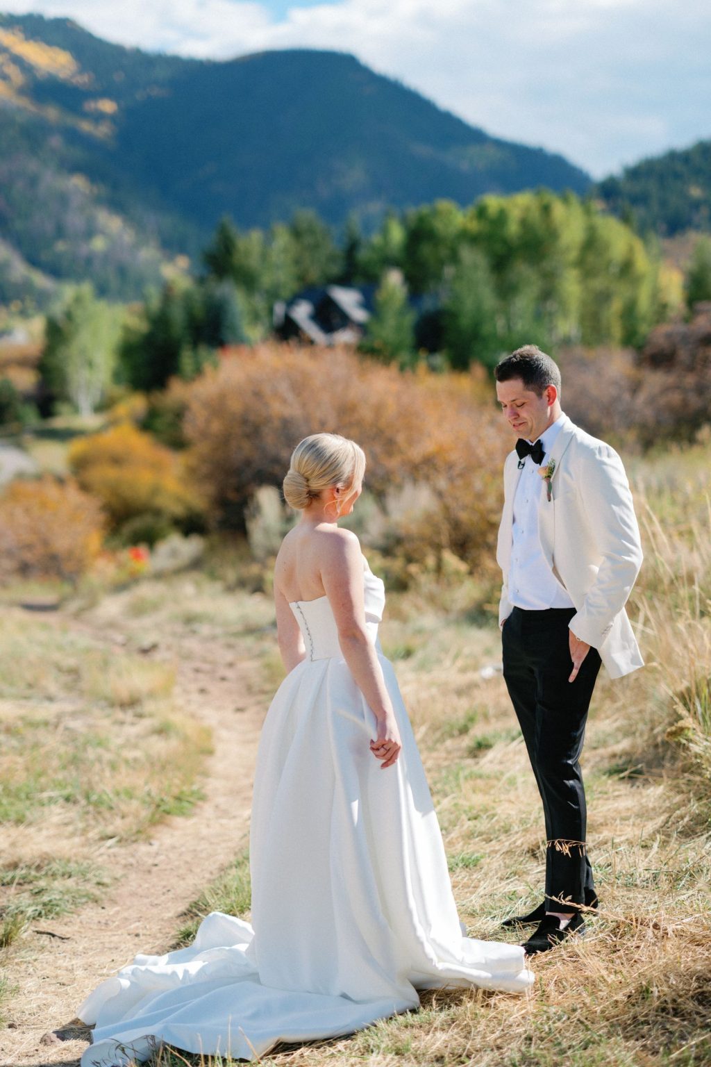 Kayla & Patrick's wedding at the Aspen Chapel and the Caribou Club: a quiet moment in the meadow