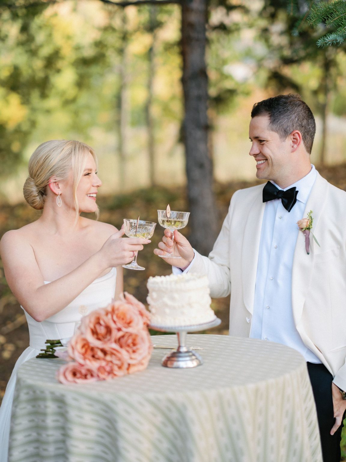 Kayla & Patrick's wedding at the Aspen Chapel and the Caribou Club: a toast at the cake table