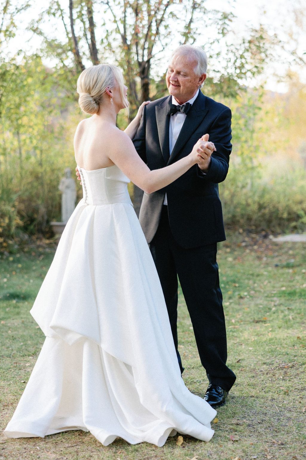 Kayla & Patrick's wedding at the Aspen Chapel and the Caribou Club: the bride with her father