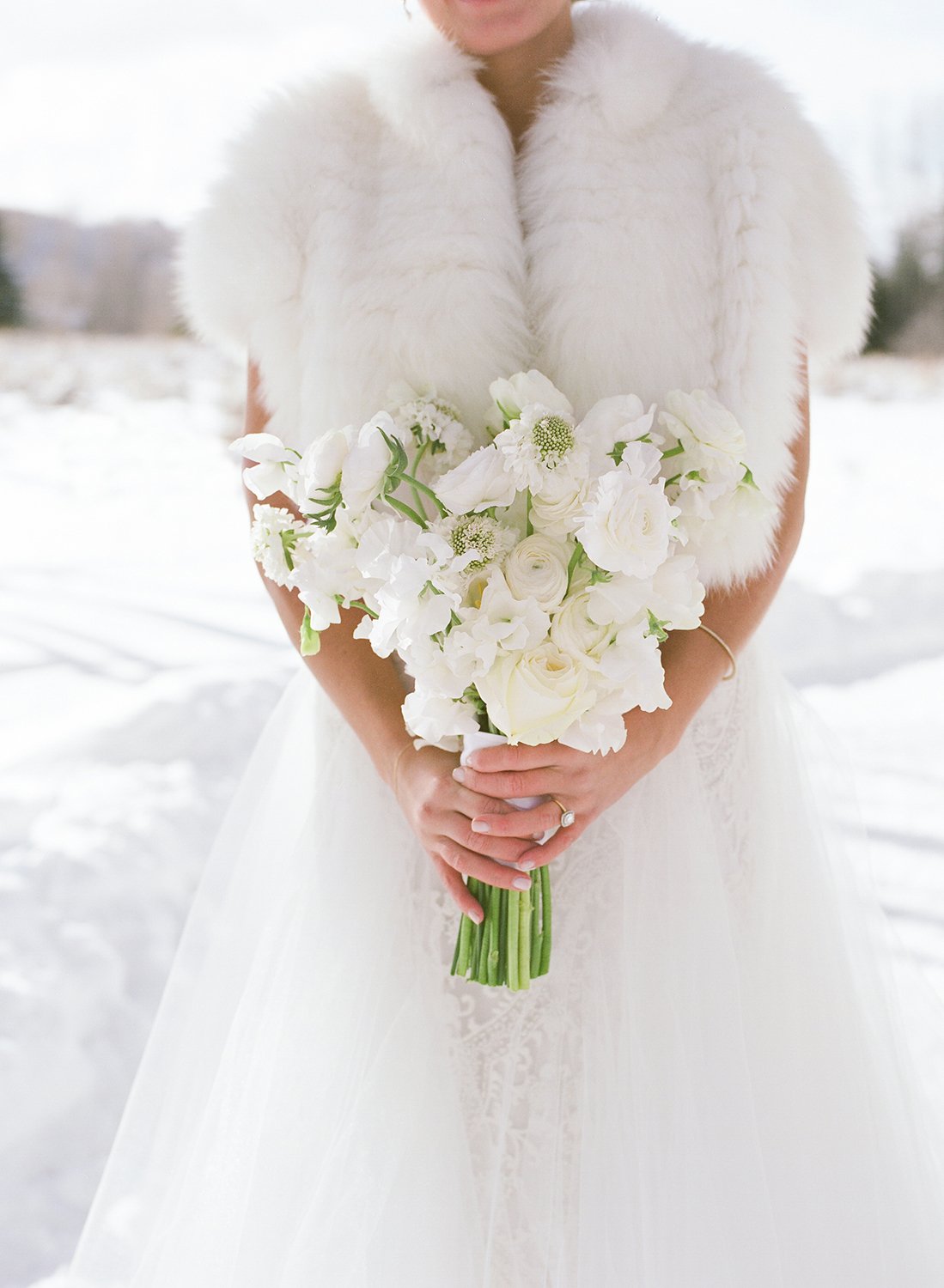 Coley & Teddy's wedding at the Aspen Chapel and Hotel Jerome: the bride's white bouquet