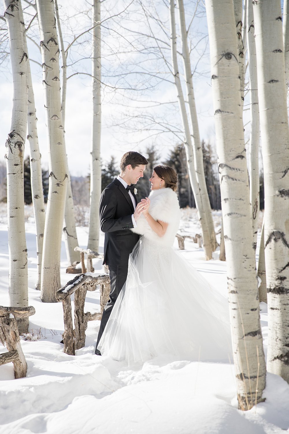 Coley & Teddy's wedding at the Aspen Chapel and Hotel Jerome: a kiss in the aspens