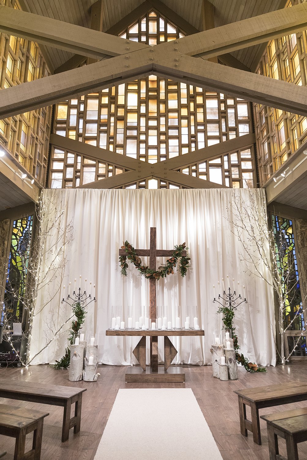 Coley & Teddy's wedding at the Aspen Chapel and Hotel Jerome: the altar at the Aspen Chapel