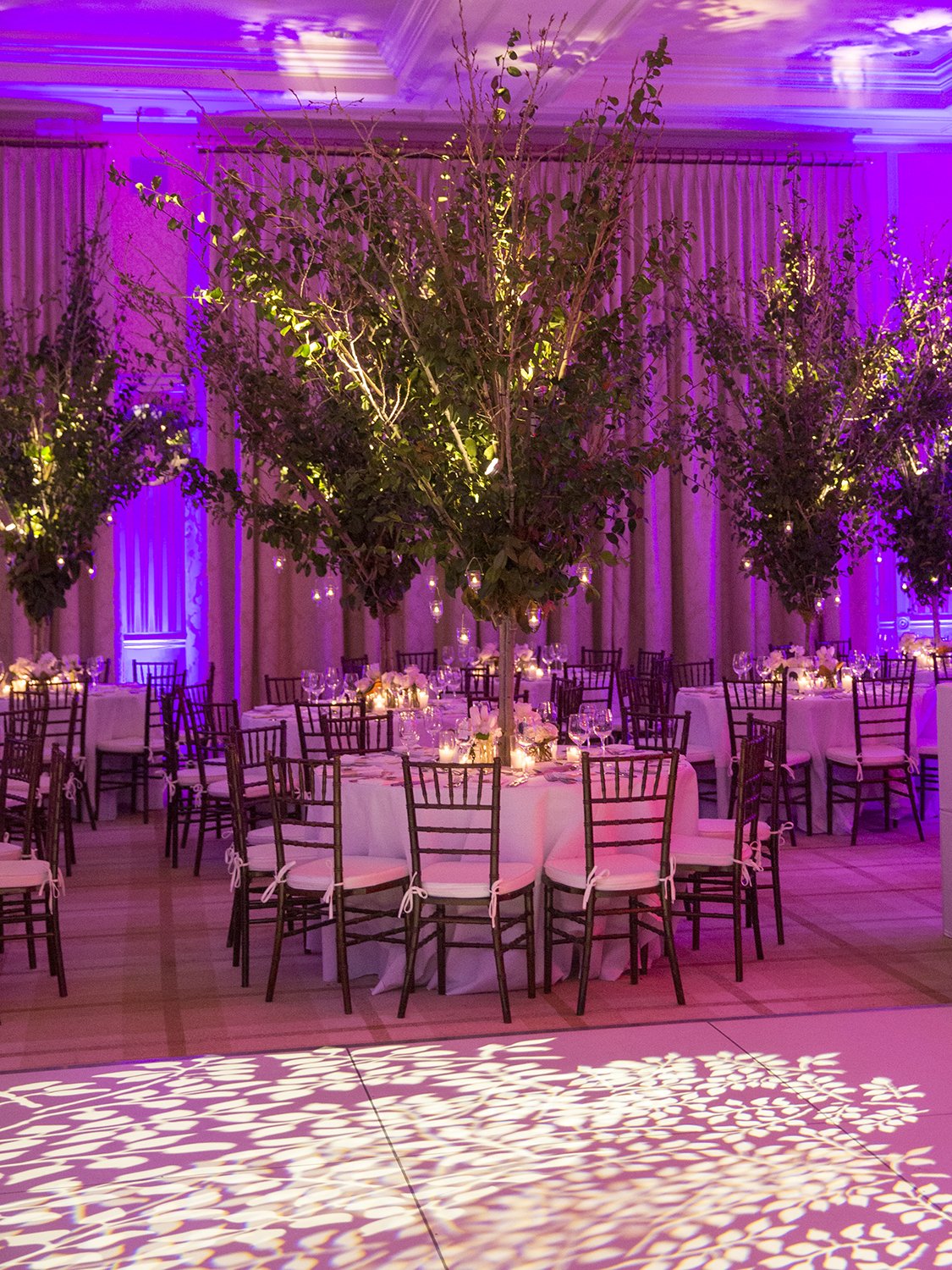 Coley & Teddy's wedding at the Aspen Chapel and Hotel Jerome: branch centerpieces in the ballroom