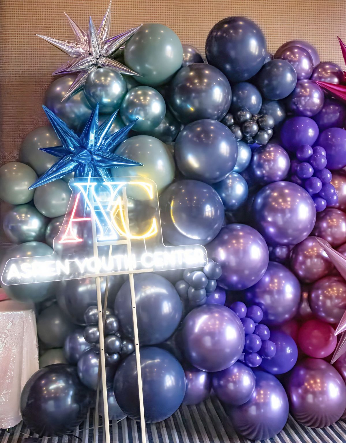 Wildest Dreams, the Aspen Youth Center gala at Hotel Jerome: a pastel balloon cloud with silver stars
