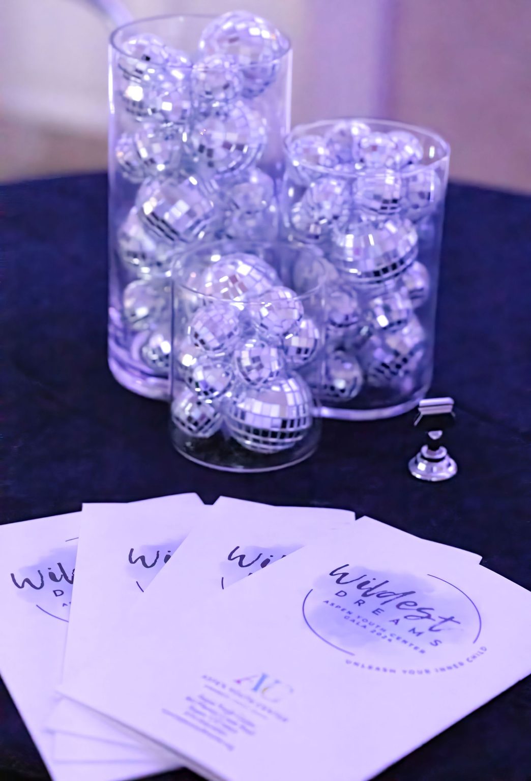 Wildest Dreams, the Aspen Youth Center gala at Hotel Jerome: mirrored centerpieces and table numbers