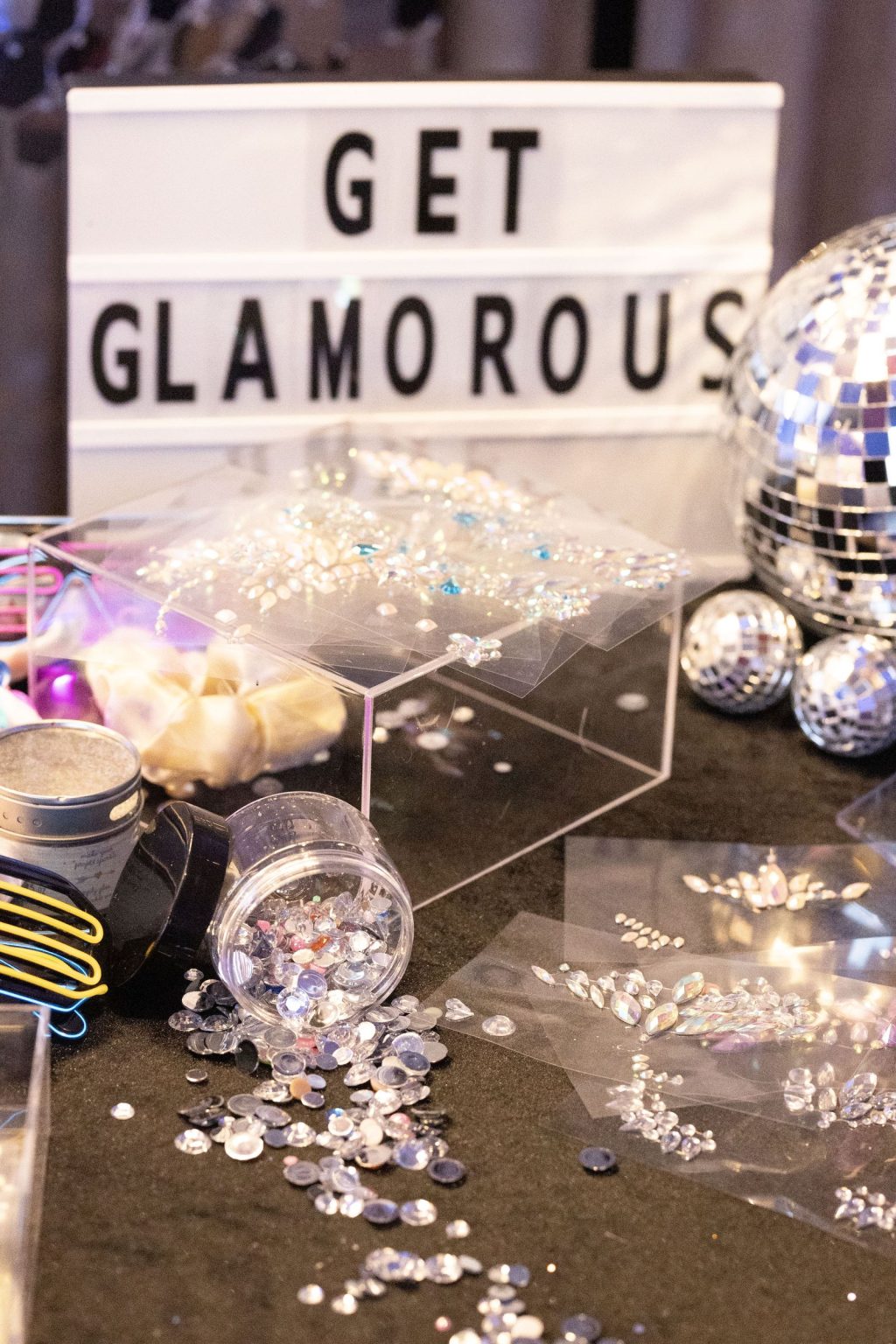 Wildest Dreams, the Aspen Youth Center gala at Hotel Jerome: the Get Glamorous Glow Bar sign