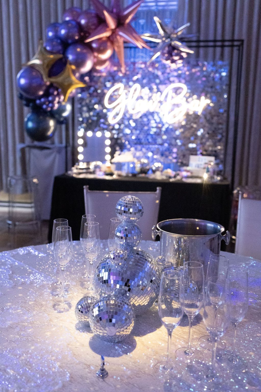 Wildest Dreams, the Aspen Youth Center gala at Hotel Jerome: a disco-ball centerpiece with Wildest Dreams signage