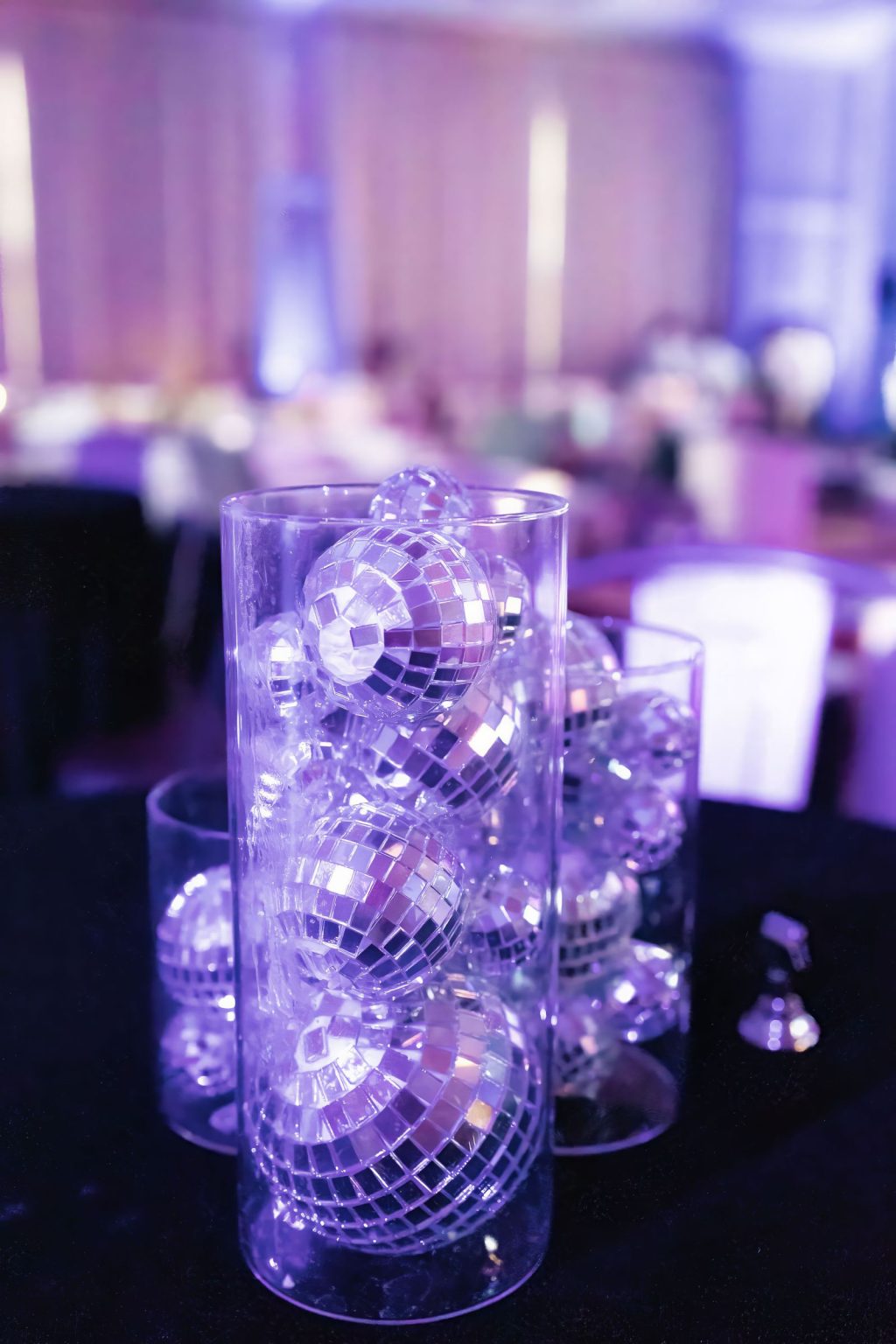 Wildest Dreams, the Aspen Youth Center gala at Hotel Jerome: disco-ball centerpieces in blue light