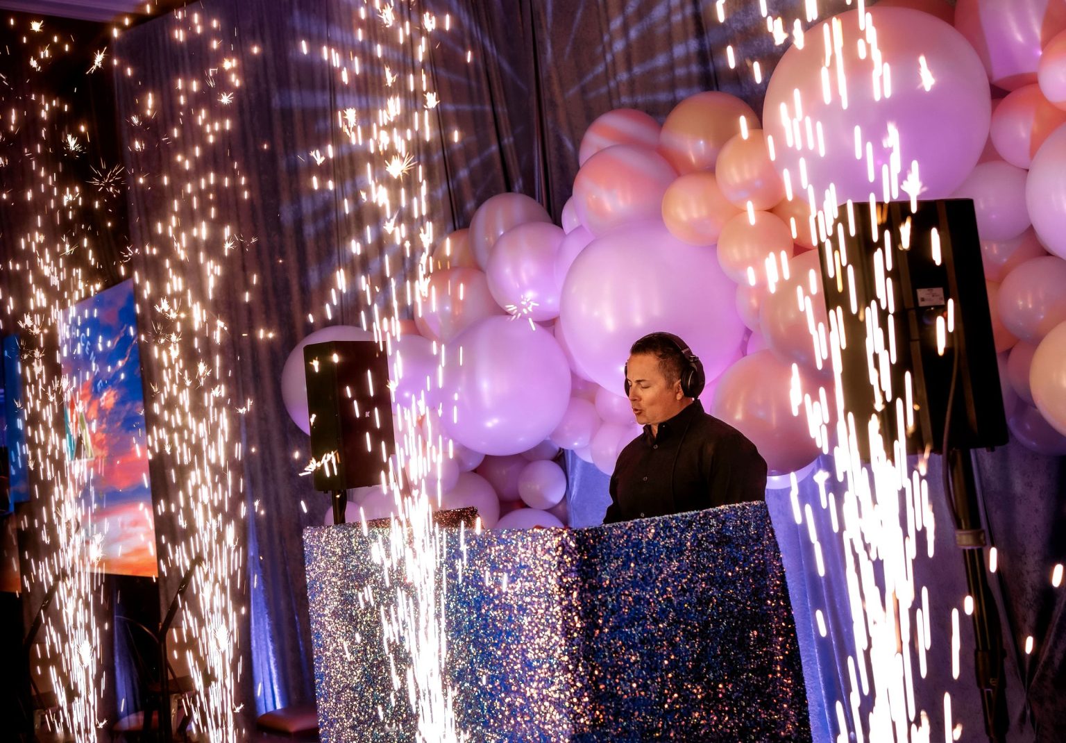 Wildest Dreams, the Aspen Youth Center gala at Hotel Jerome: cold sparklers beside the DJ booth and balloon wall