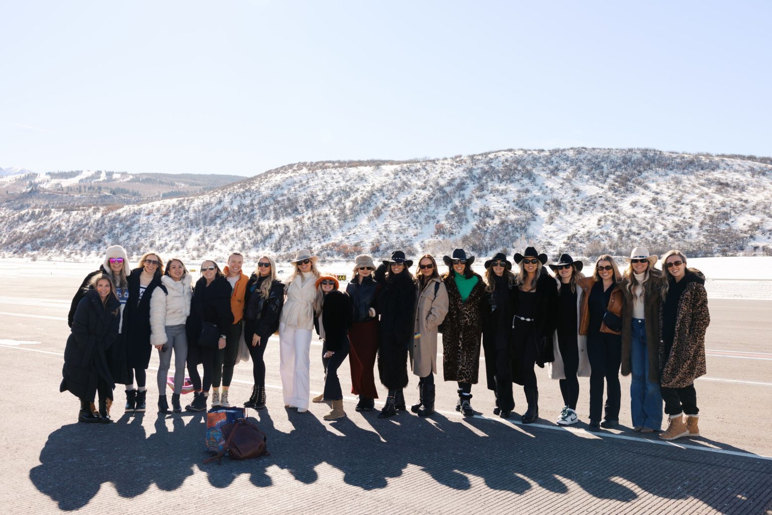 Hayley's Aspen bachelorette weekend: the group on the tarmac after the private charter landed