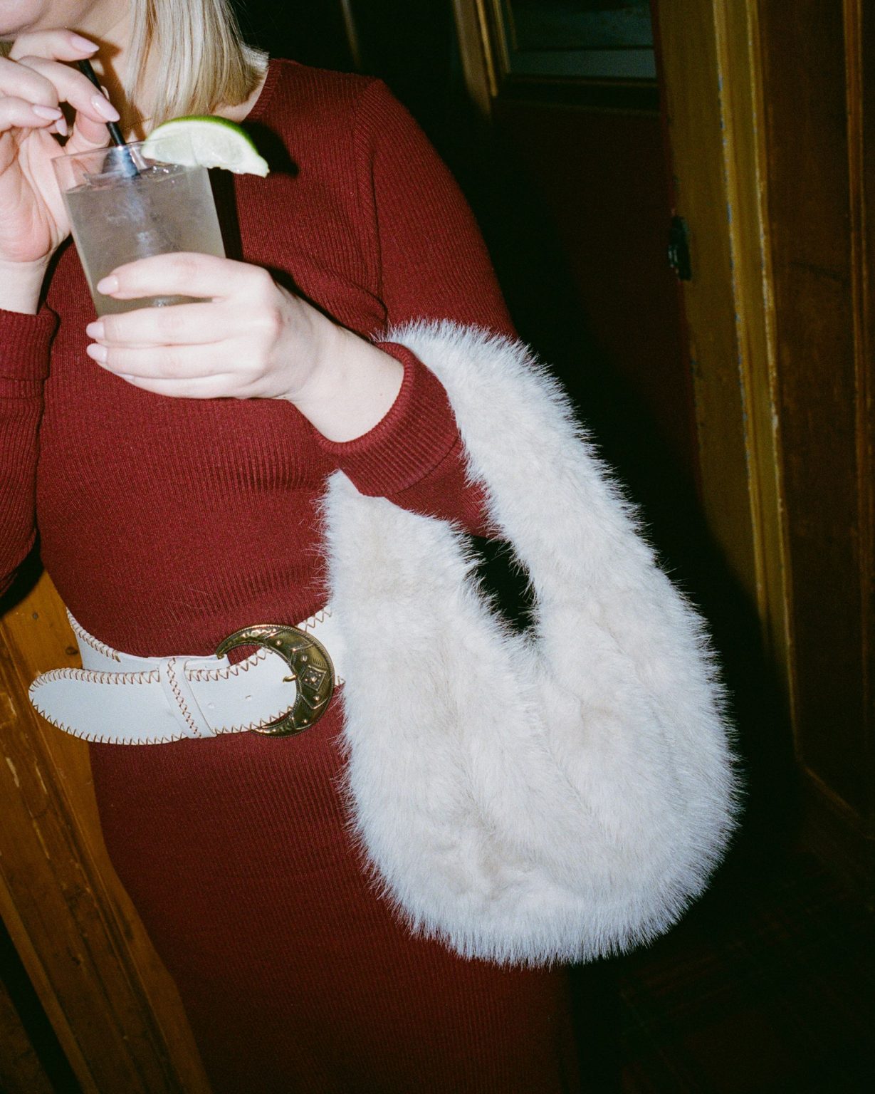 Hayley's Aspen bachelorette weekend: a cocktail and a fur bag
