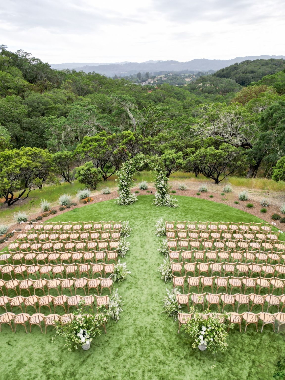 Sydney and Keaton's destination wedding at Montage Healdsburg, California: the ceremony on the Oak Lawn