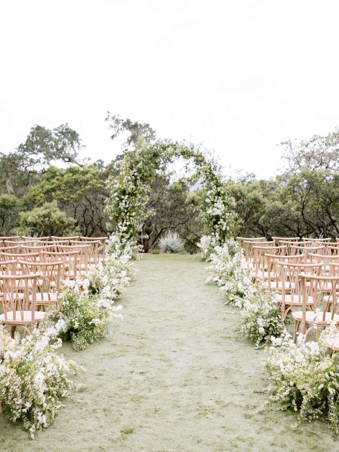 Sydney and Keaton's destination wedding at Montage Healdsburg, California: the ceremony on the Oak Lawn