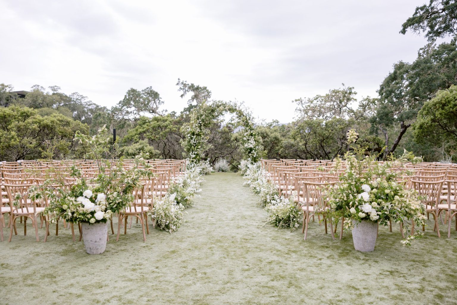 Sydney and Keaton's destination wedding at Montage Healdsburg, California: the ceremony on the Oak Lawn