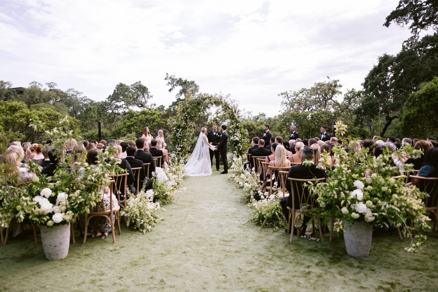 Sydney and Keaton's destination wedding at Montage Healdsburg, California: the ceremony on the Oak Lawn
