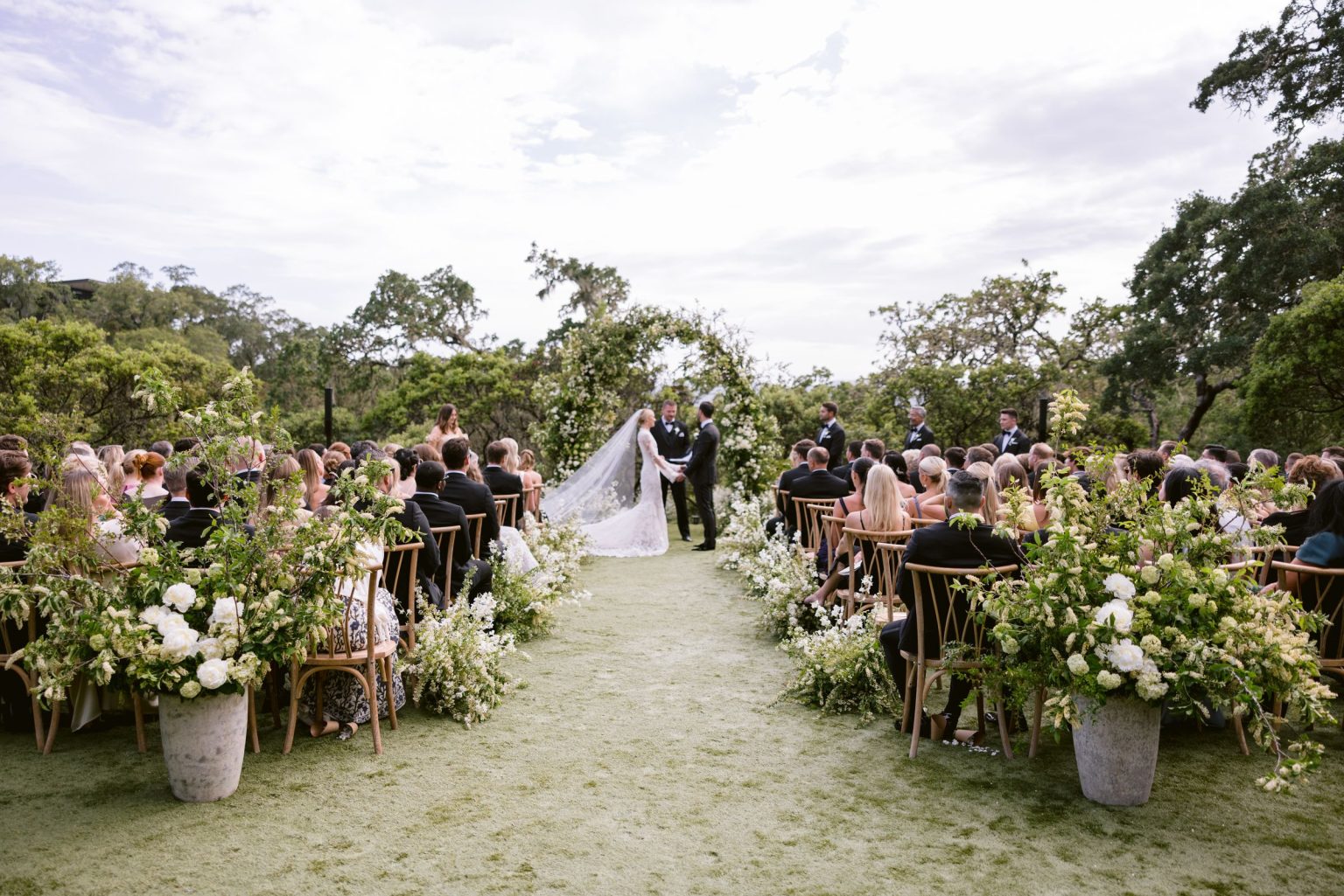 Sydney and Keaton's destination wedding at Montage Healdsburg, California: the ceremony on the Oak Lawn