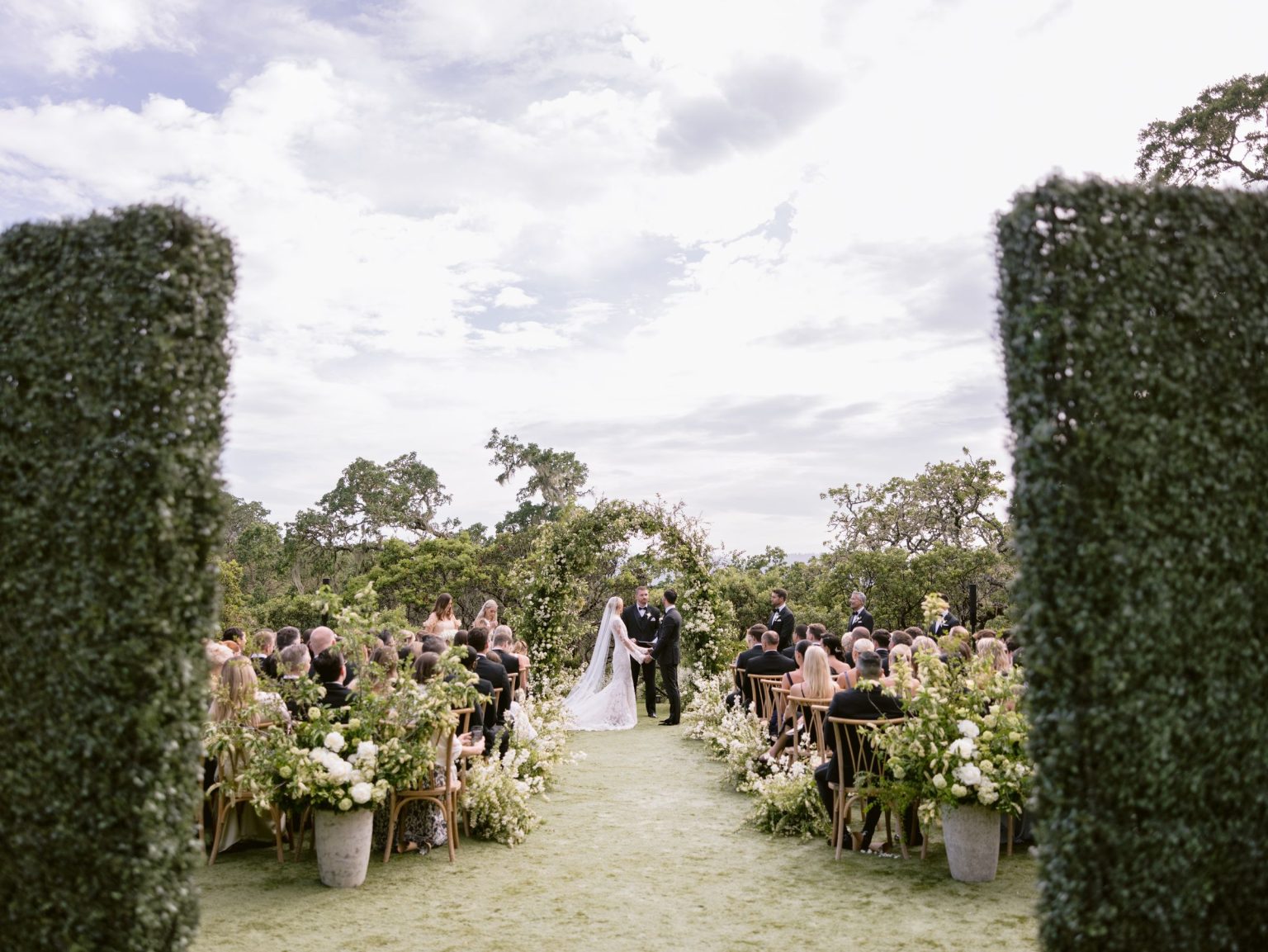 Sydney and Keaton's destination wedding at Montage Healdsburg, California: the ceremony on the Oak Lawn