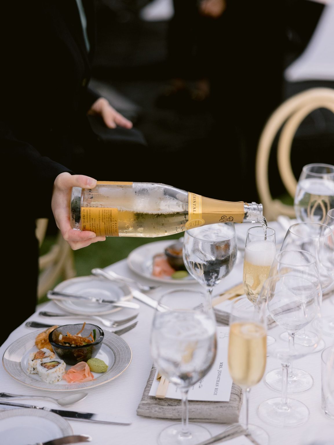 Sydney and Keaton's destination wedding at Montage Healdsburg, California: the reception tent on the Grand Lawn