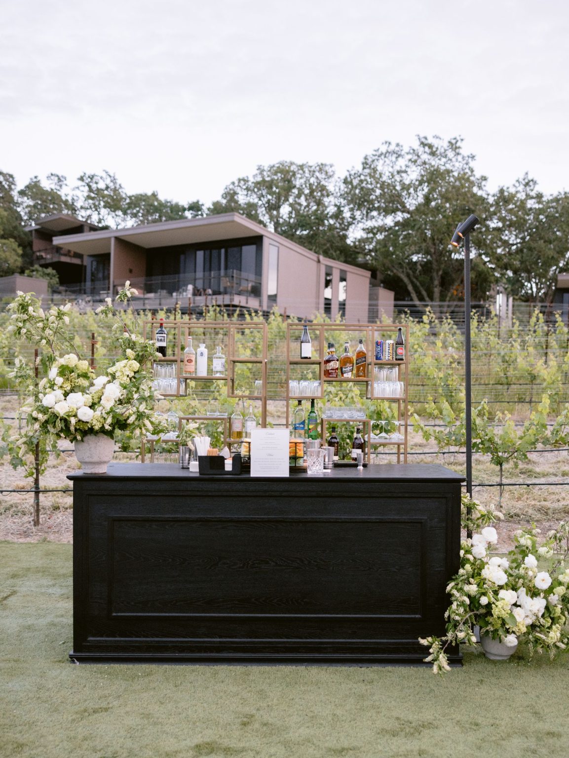 Sydney and Keaton's destination wedding at Montage Healdsburg, California: the reception tent on the Grand Lawn