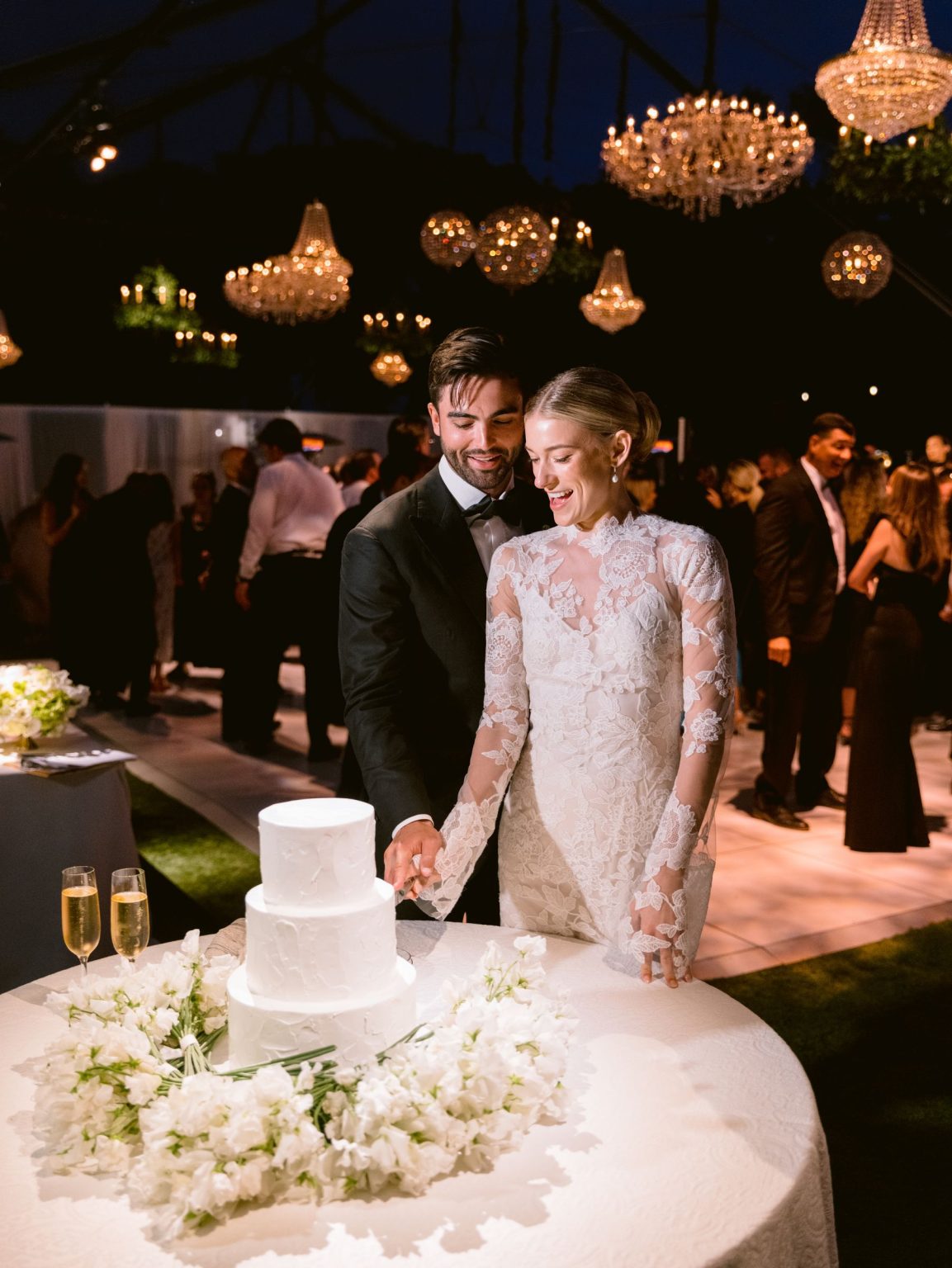 Sydney and Keaton's destination wedding at Montage Healdsburg, California: the reception tent on the Grand Lawn