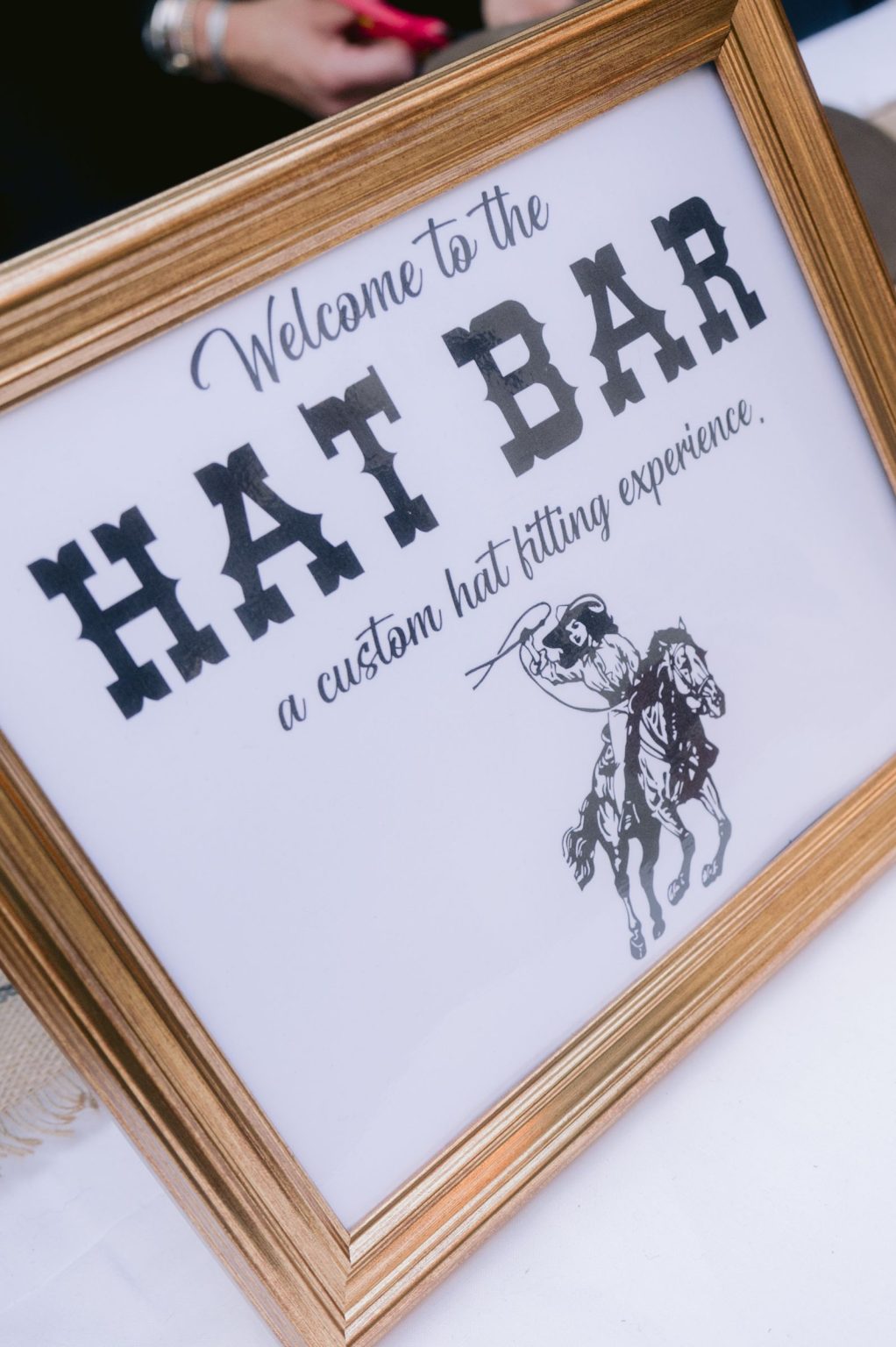 Addy & Nick's wedding at Hotel Jerome, Aspen: the Hat Bar sign at the rehearsal dinner