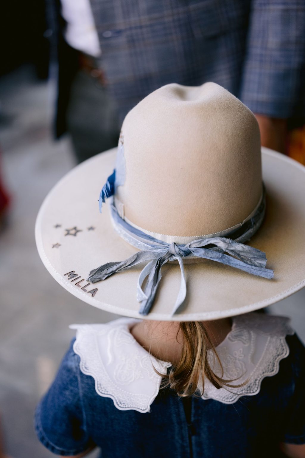 Addy & Nick's wedding at Hotel Jerome, Aspen: a custom hat with ribbon trim