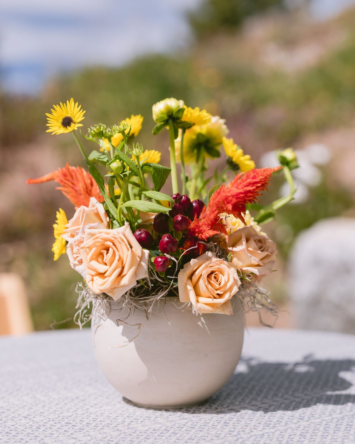 Addy & Nick's wedding at Hotel Jerome, Aspen: welcome party florals in autumn tones
