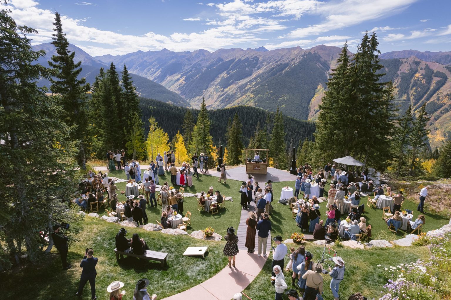 Addy & Nick's wedding at Hotel Jerome, Aspen: the welcome party lawn above the valley
