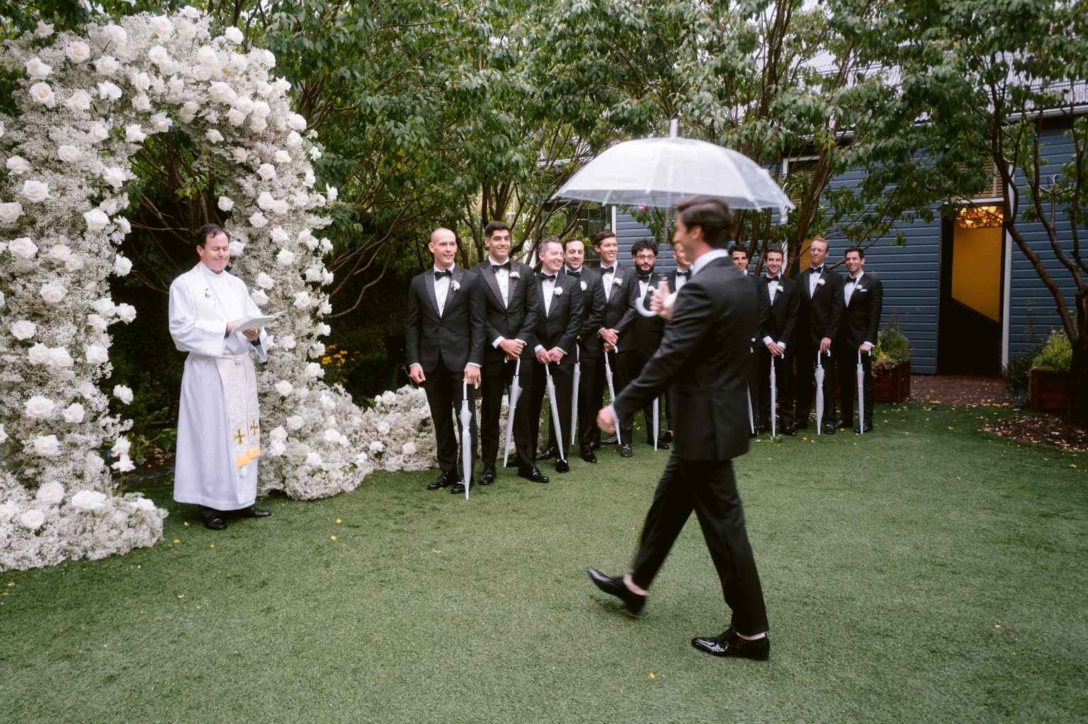 Addy & Nick's wedding at Hotel Jerome, Aspen: the white floral arch in the courtyard