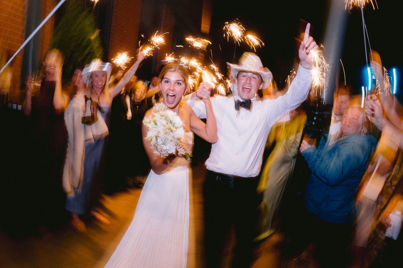 Addy & Nick's wedding at Hotel Jerome, Aspen: sparklers lighting the exit
