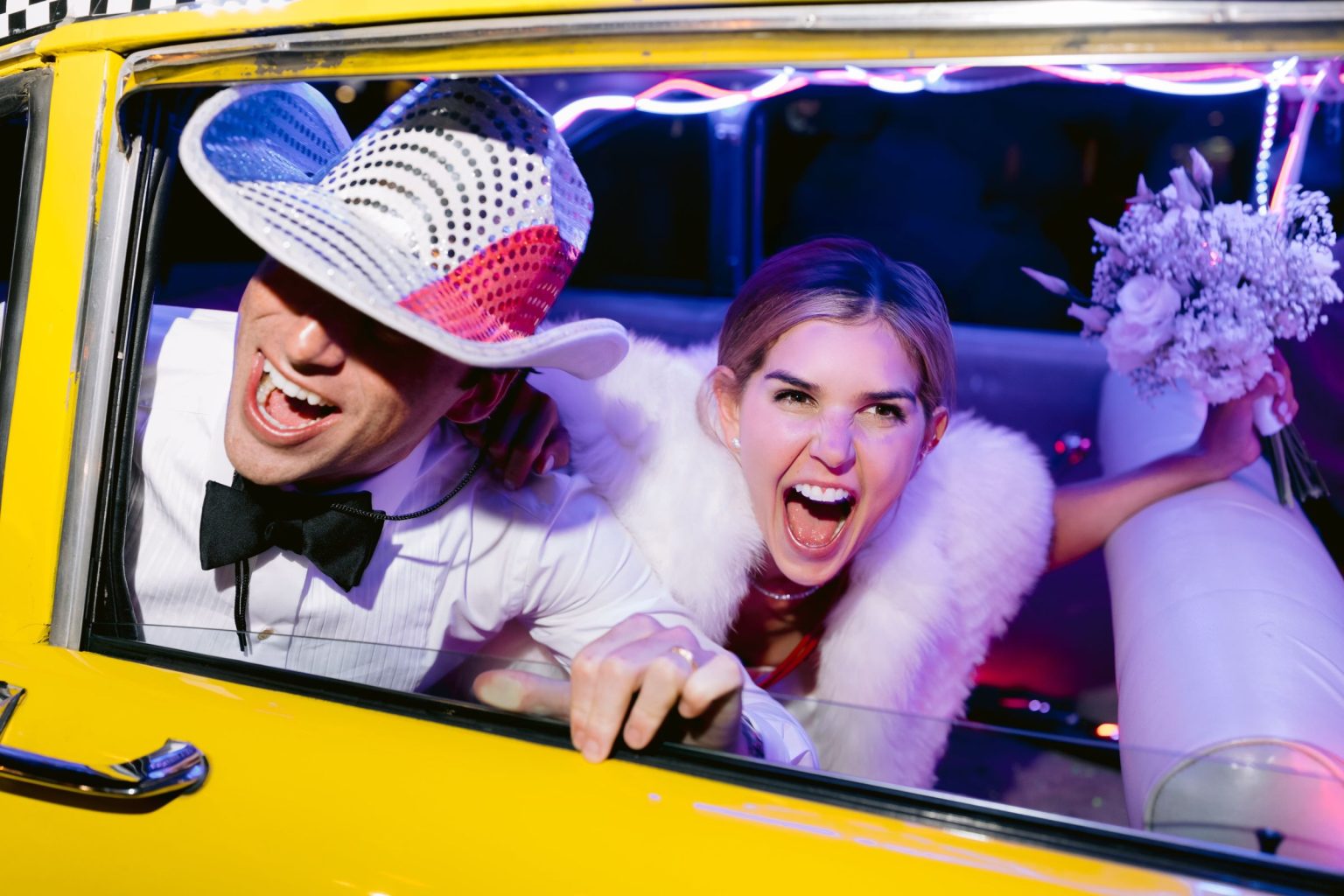 Addy & Nick's wedding at Hotel Jerome, Aspen: departing in the Ultimate Taxi