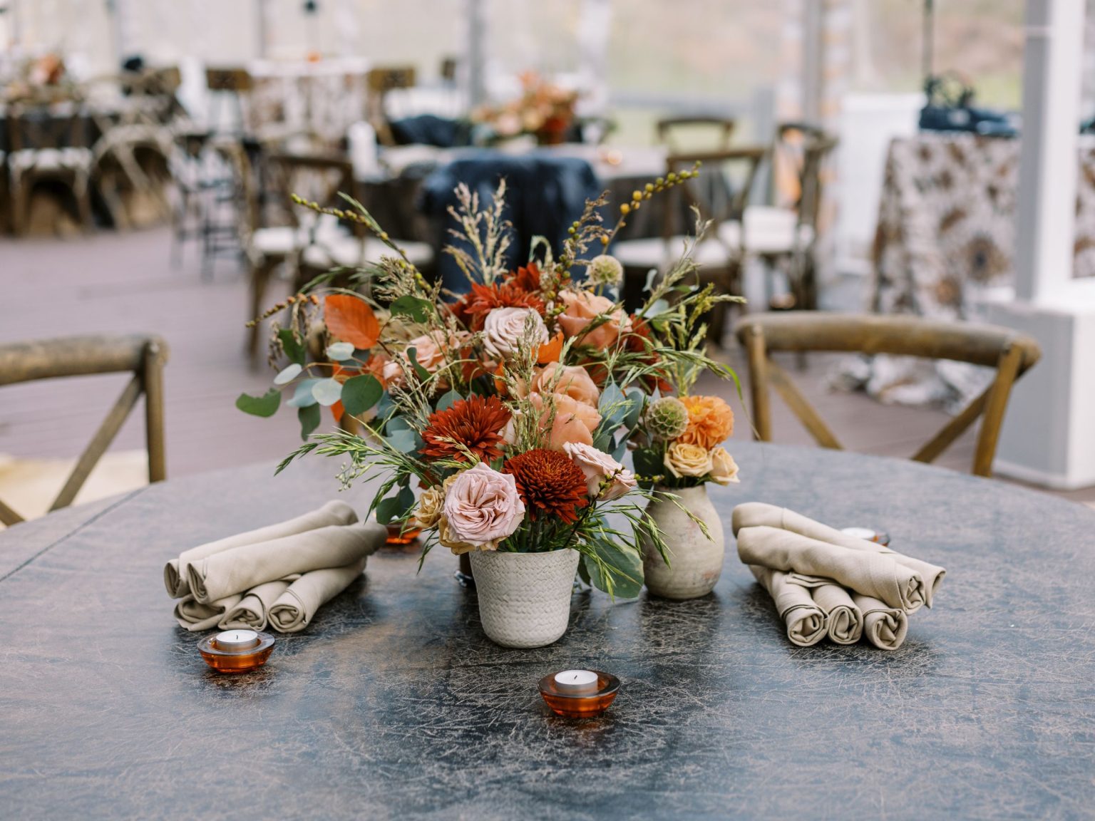 Abby & David's wedding at Hotel Jerome, Aspen: welcome party florals in rust, peach, and blush