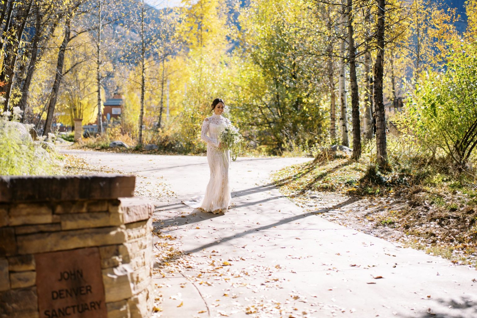 Abby & David's wedding at Hotel Jerome, Aspen: the bride on the path before the first look