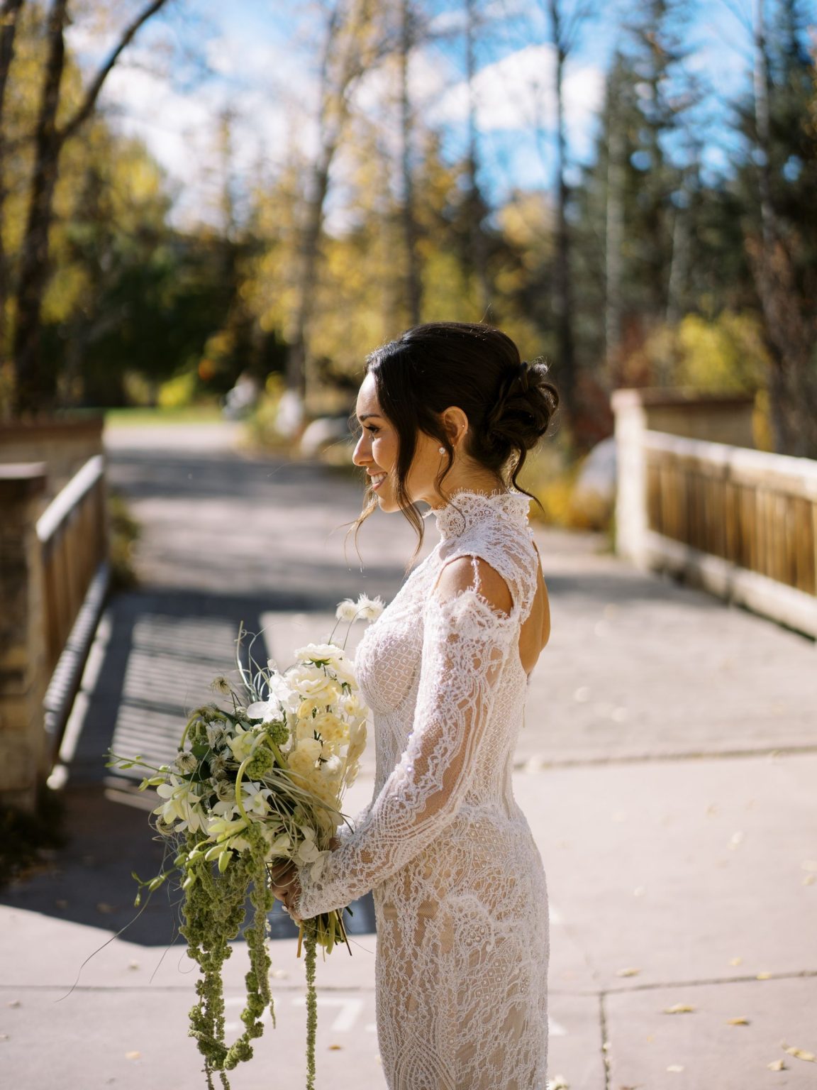 Abby & David's wedding at Hotel Jerome, Aspen: the bride with her bouquet