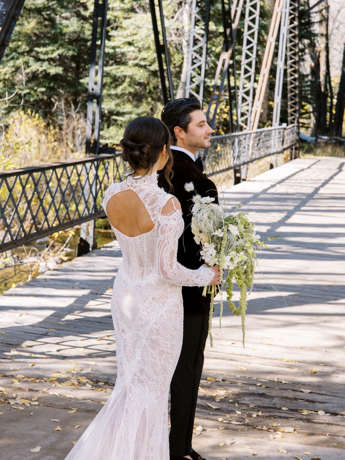 Abby & David's wedding at Hotel Jerome, Aspen: the first look on the bridge