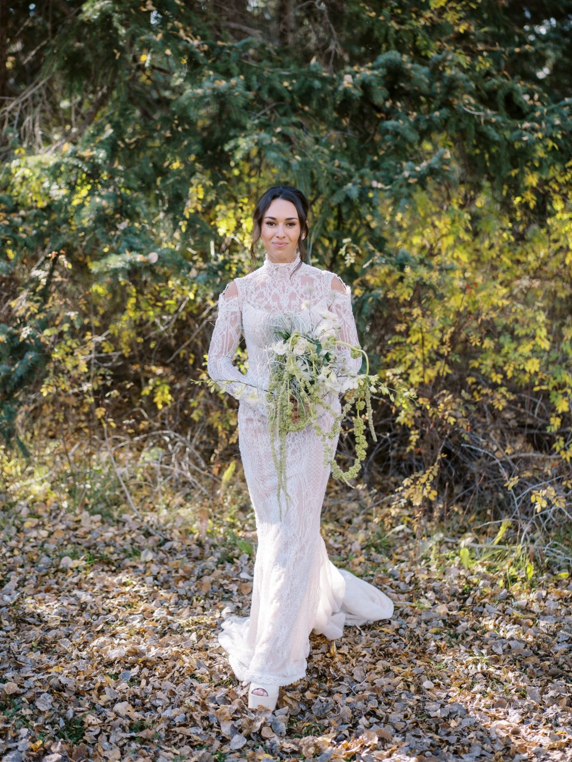 Abby & David's wedding at Hotel Jerome, Aspen: the bride among the aspens