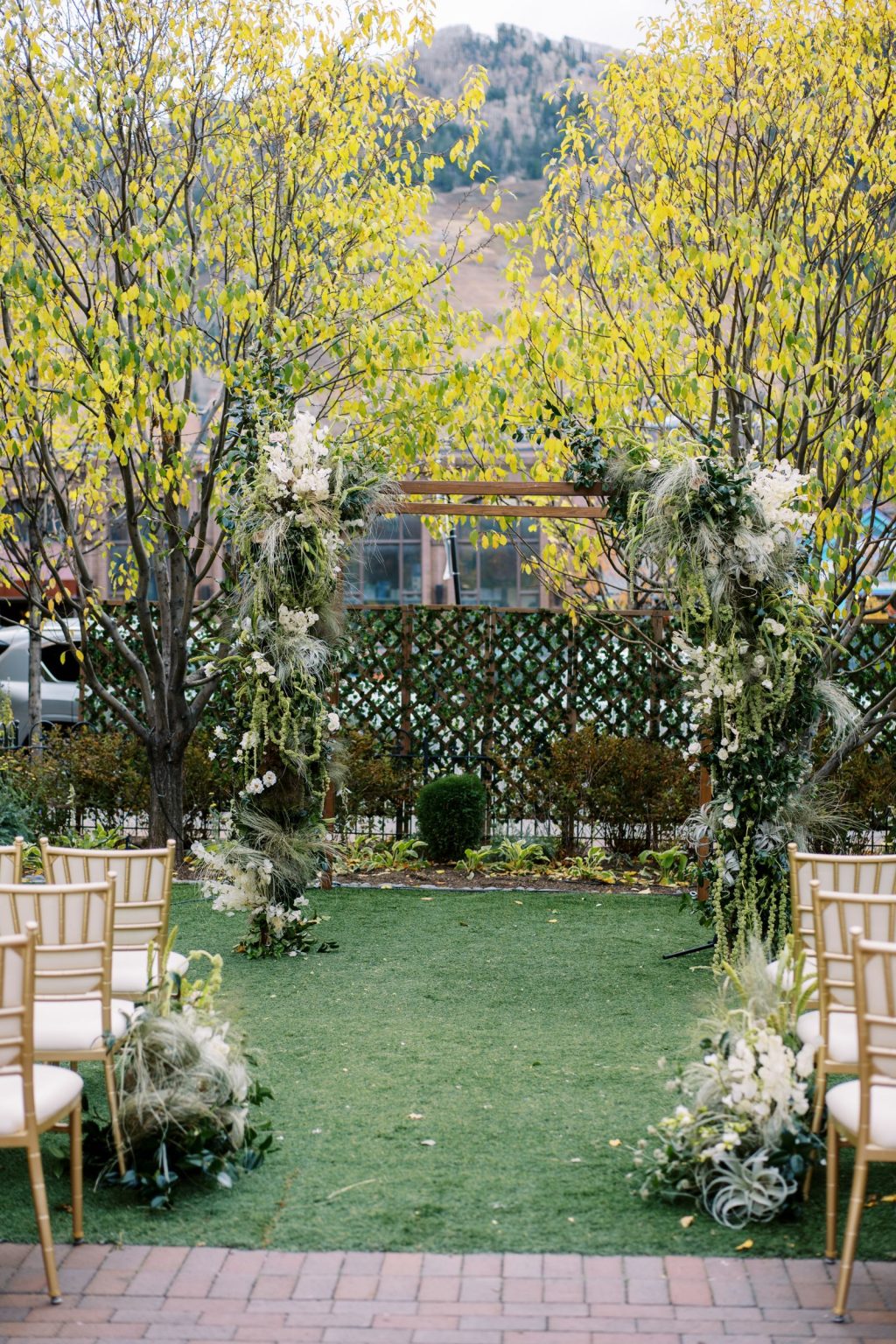 Abby & David's wedding at Hotel Jerome, Aspen: the ceremony aisle and chuppah