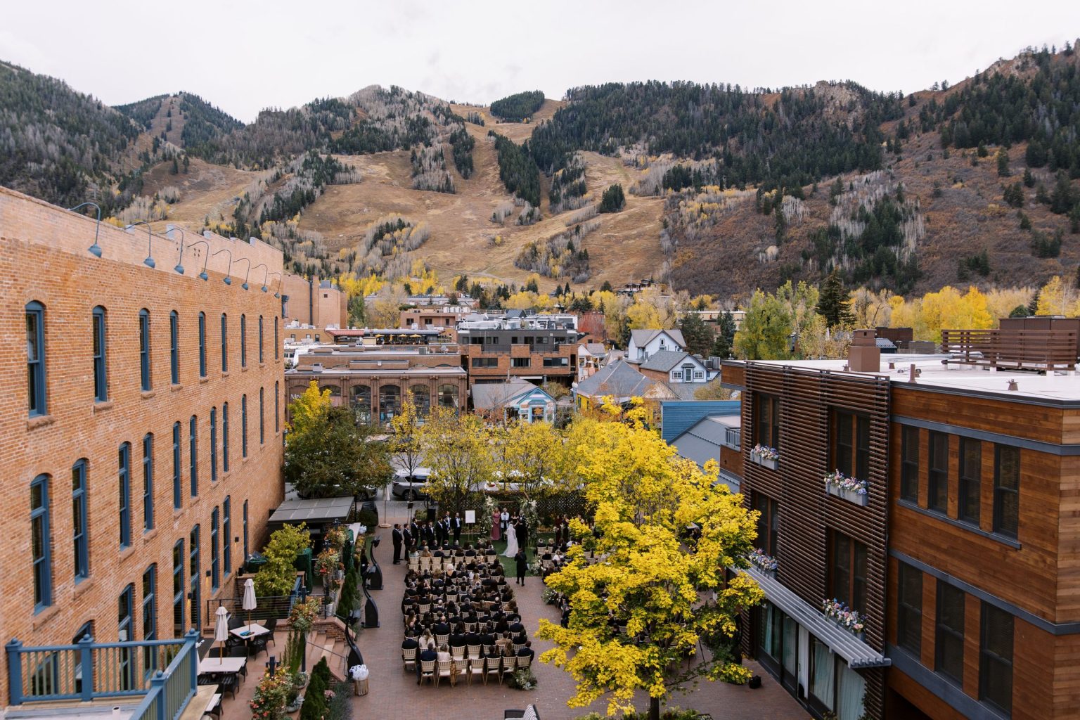 Abby & David's wedding at Hotel Jerome, Aspen: the courtyard ceremony from above