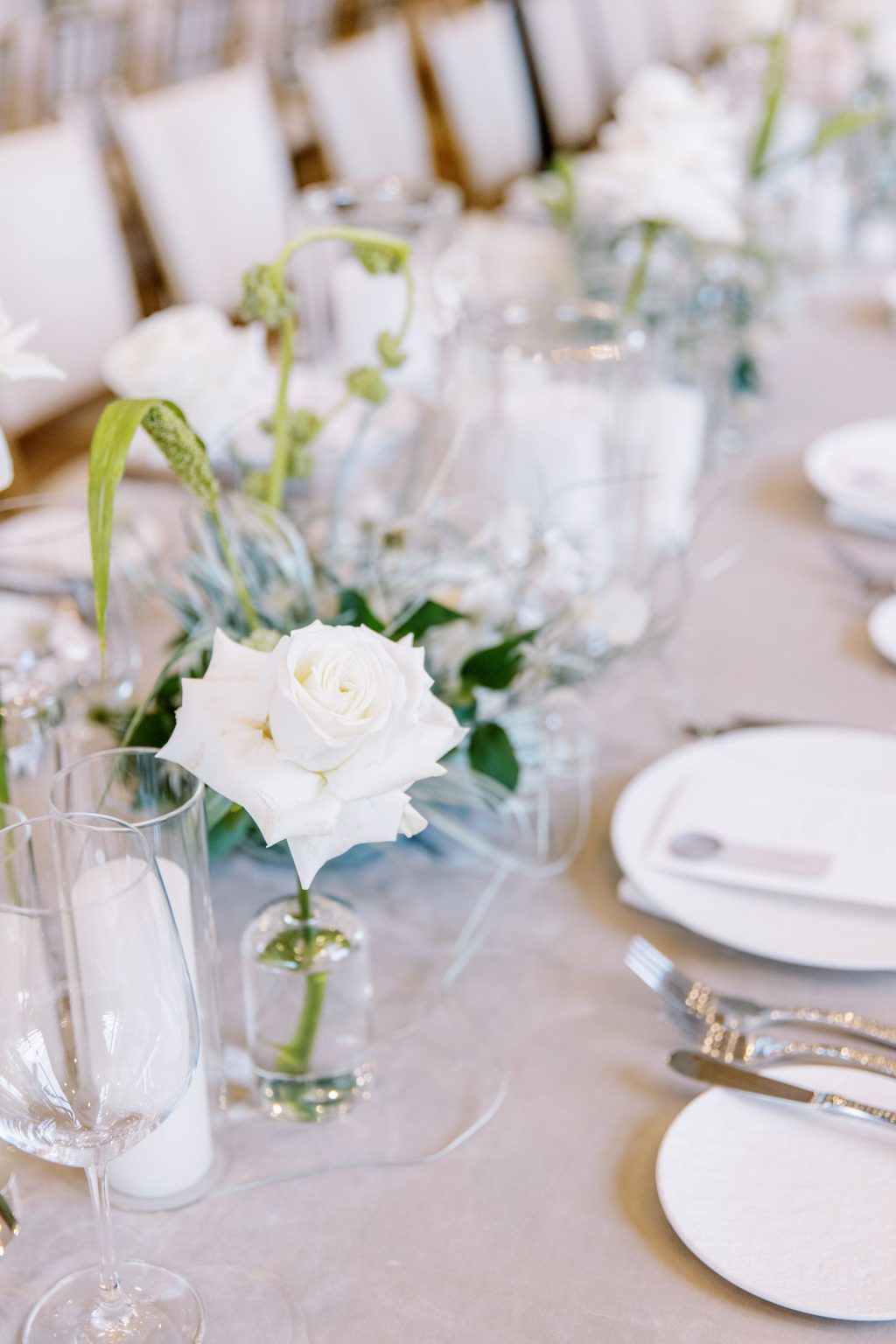 Abby & David's wedding at Hotel Jerome, Aspen: white roses and place settings