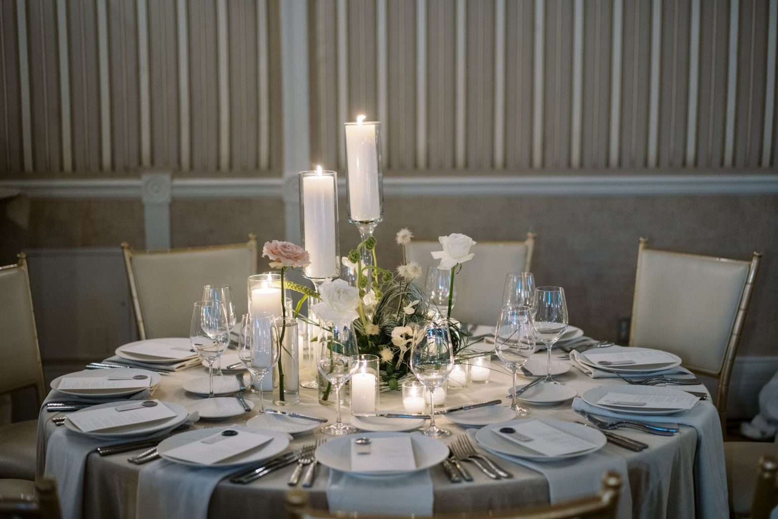 Abby & David's wedding at Hotel Jerome, Aspen: a candlelit round table