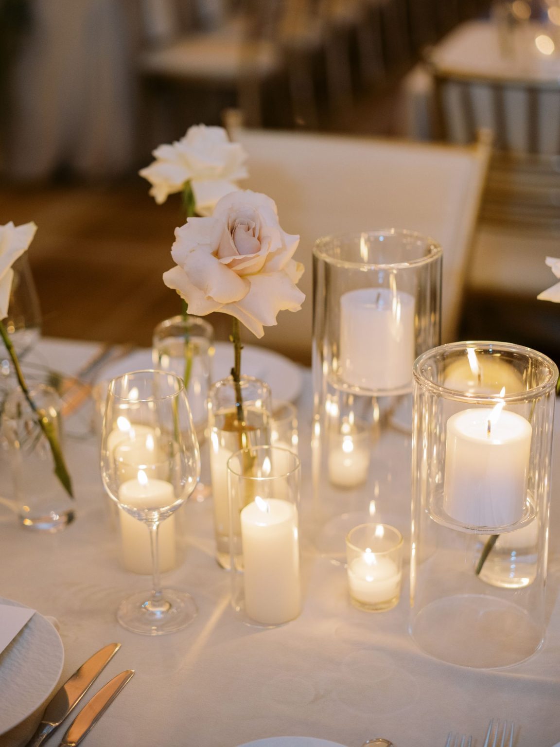 Abby & David's wedding at Hotel Jerome, Aspen: a single rose among the candles