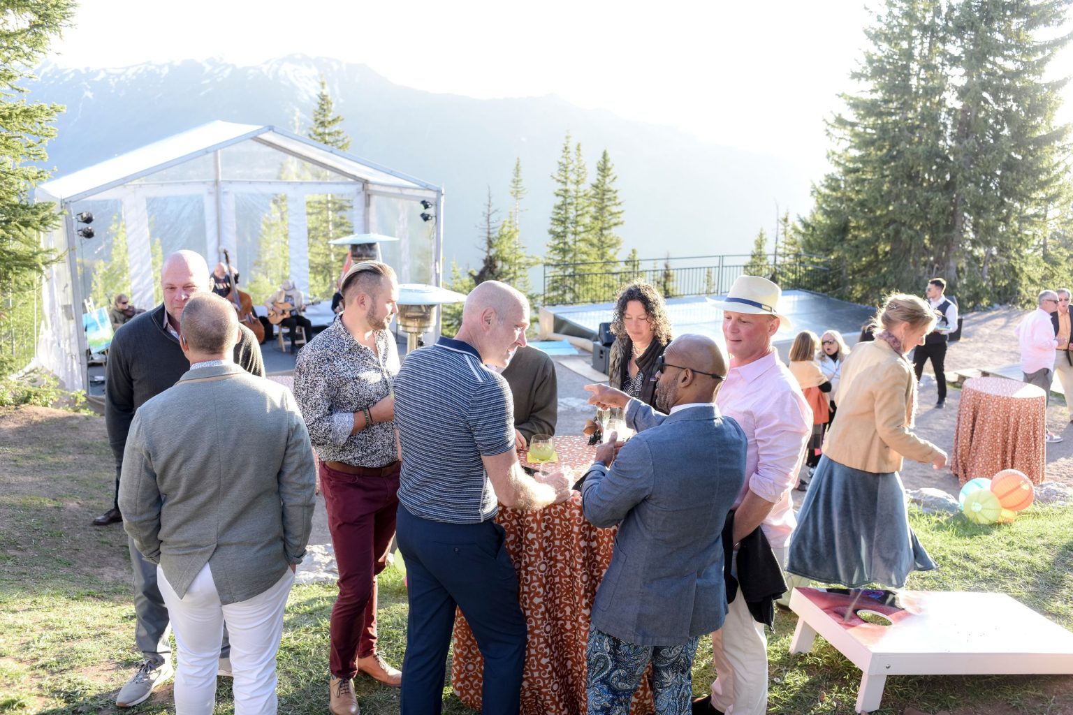 Jeff's 60th birthday on Aspen Mountain: guests gathered on the Wedding Deck lawn at sunset