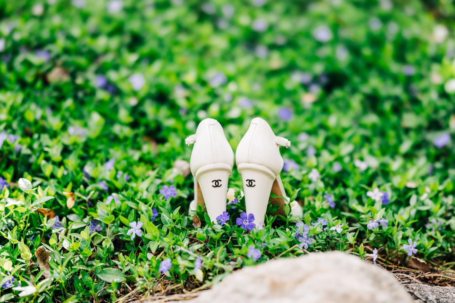 Julie & Tobias's wedding on the Northstar Preserve, Aspen: bridal shoes in the grass