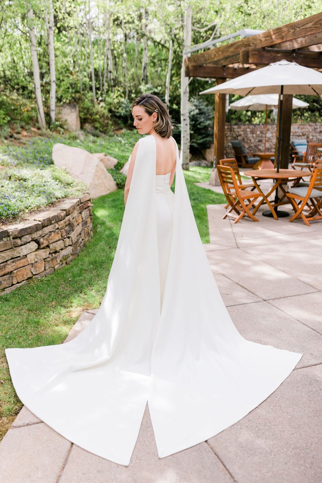 Julie & Tobias's wedding on the Northstar Preserve, Aspen: the bride's gown and cape