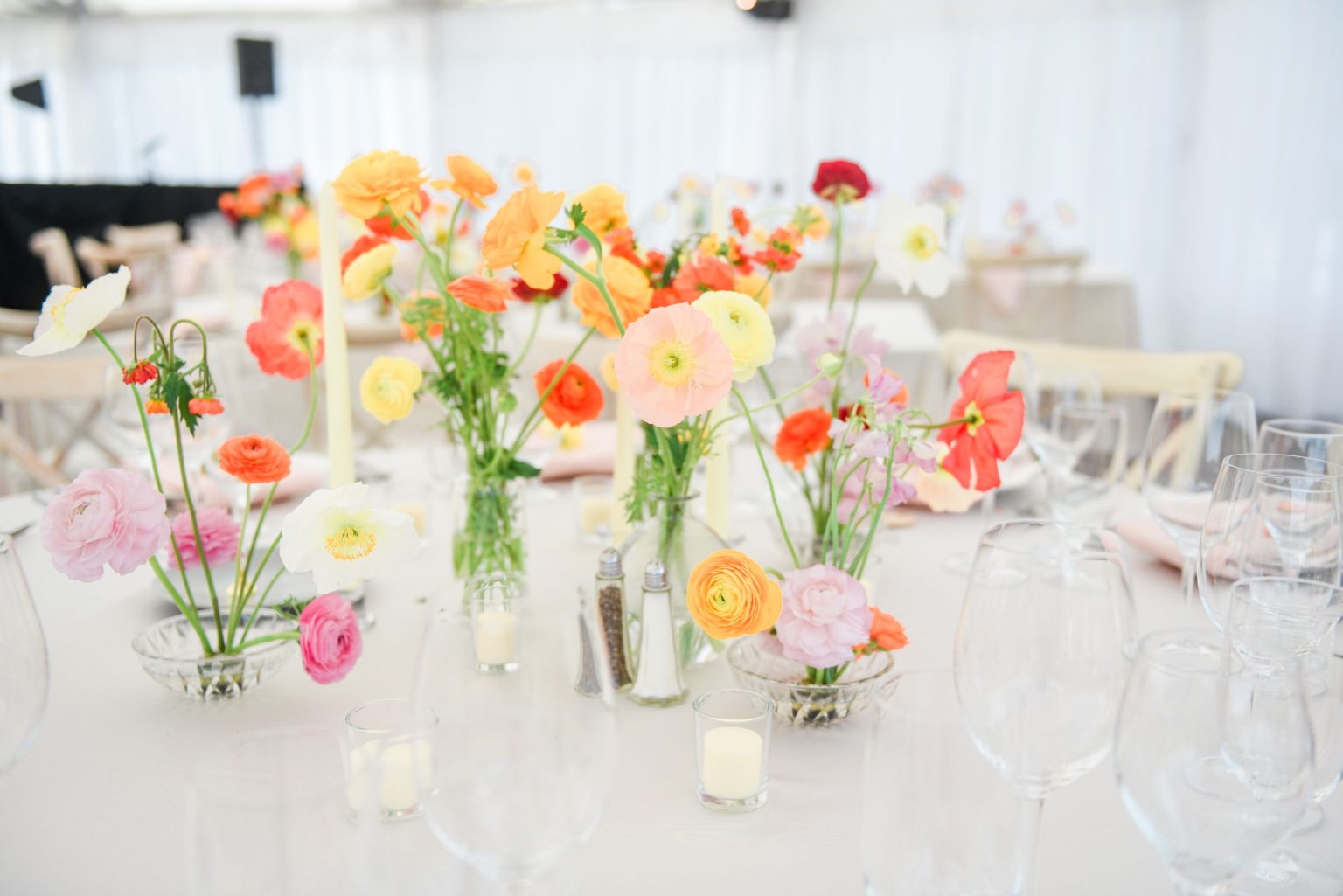 Julie & Tobias's wedding on the Northstar Preserve, Aspen: bud vases clustered on the table