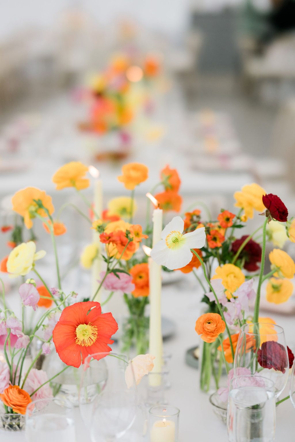 Julie & Tobias's wedding on the Northstar Preserve, Aspen: bud vases down a long table