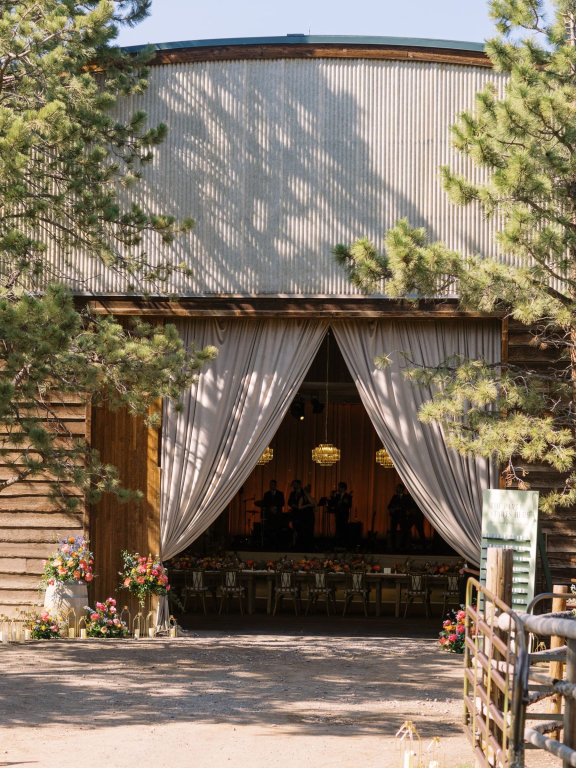 Clare and Kobe's McCabe Ranch wedding in Old Snowmass, Colorado: velvet drapery at the barn entrance