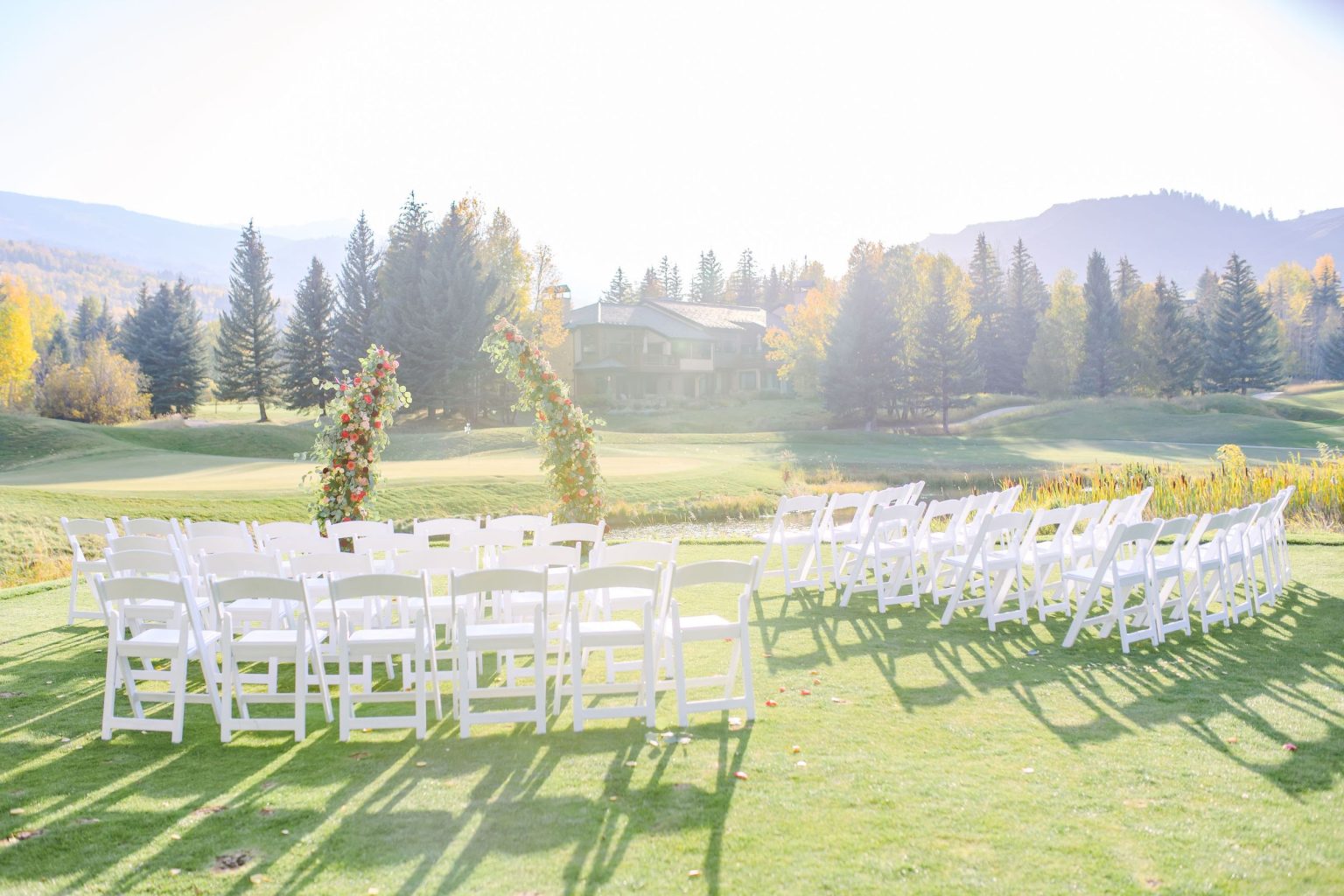 Ryann and Cole's wedding at the Snowmass Club, Snowmass Village: the ceremony arches on the lawn