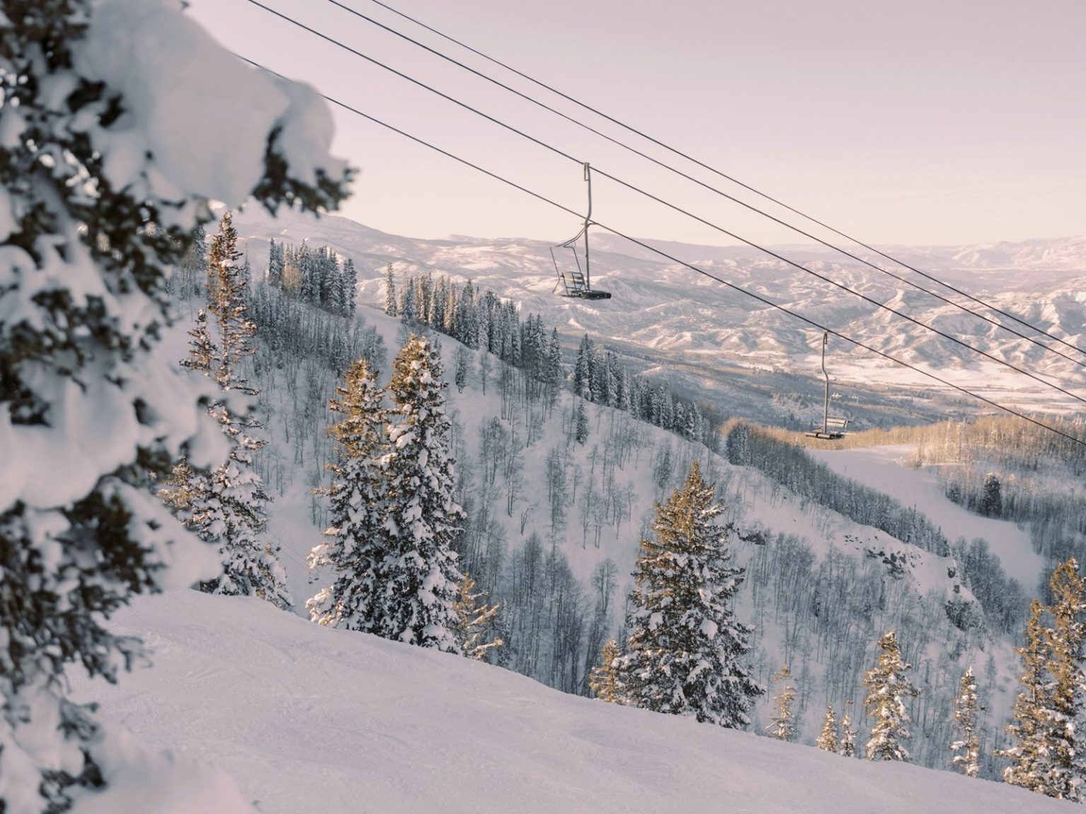 Marisa and Ashton's winter wedding at The St. Regis Aspen: snow-covered Aspen Mountain