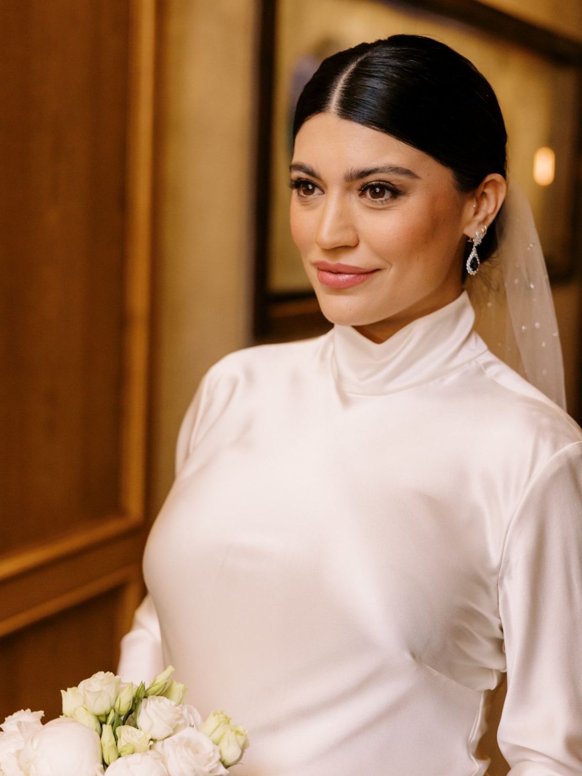 Marisa and Ashton's winter wedding at The St. Regis Aspen: the ceremony in the Capitol Room